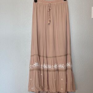 Elegant Tan Maxi Skirt with White Floral Detail
